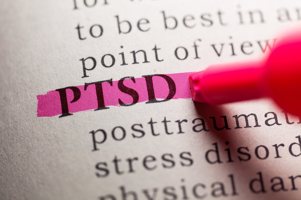 The term PTSD highlighted in a textbook